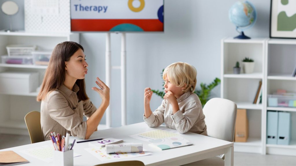 Speech Therapist in Melbourne guiding young child.