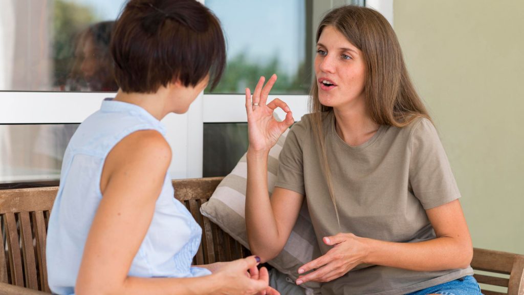 Speech Therapist in Melbourne using hand gestures.